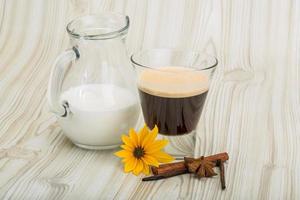 Espresso on wooden background photo