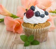 Cupcakes with berries photo