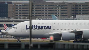 FRANKFURT AM MAIN, GERMANY JULY 19, 2017 - Lufthansa Airbus 380 D AIMH named  Deutchland  taxiing to start. Fraport, Frankfurt, Germany video