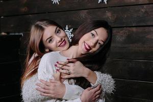 Two beautiful girls at Christmas photo