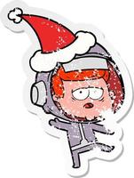 pegatina angustiada caricatura de un astronauta cansado con gorro de Papá Noel vector