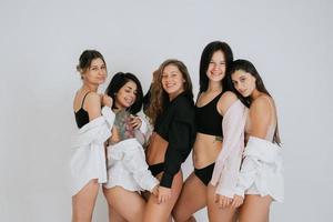 diverse models wearing comfortable underwear, enjoying time together photo