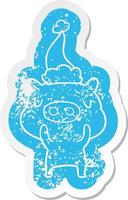 cartoon distressed sticker of a content pig wearing santa hat vector