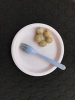 Cilok, traditional food from West Java, Indonesia, made from tapioca, chewy textured. On a dark background photo