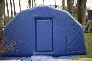 Blue portable sauna. Outdoor sauna. Inflatable room. photo