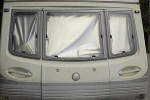 Window in motor home. Trailer parts. Transport for families and travel. photo