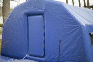 Blue portable sauna. Outdoor sauna. Inflatable room. photo