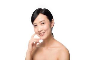 Portrait of beautiful young asian woman clean fresh bare skin concept. Asian girl beauty face skincare and health wellness, Facial treatment, Perfect skin, Natural make up on white background photo