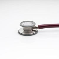 The diaphragm of medical stethoscope isolated on a white background photo