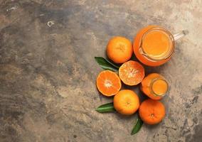 Top view of orange juice on cement floor photo