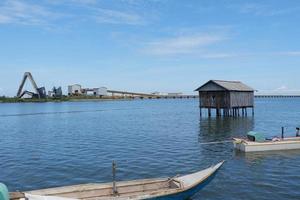 Pangkajene dan Kepulauan, South Sulawesi, Indonesia - April 16, 2022, Scenery of beautiful view of a house above the sea photo