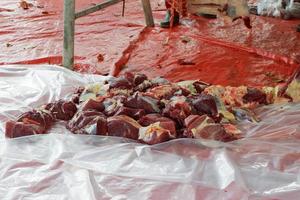 East Jakarta, Indonesia - July 12, 2022, Pieces of meat placed on a plastic in Idul Adha Event photo