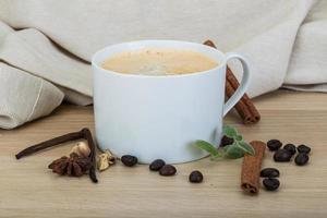 Coffee on wooden background photo