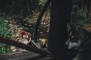 beautiful couple on the background of forest photo