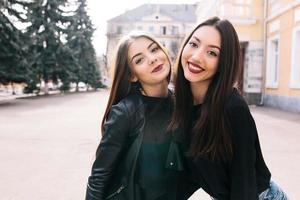 Two young adult girls photo