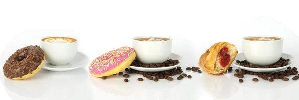 Coffee cups in render style isolated on the white background. Macchiato drinks with leafs on the top. White mugs on plates with coffee seeds, chocolate, raspberry doghnuts and croissant with jam. photo