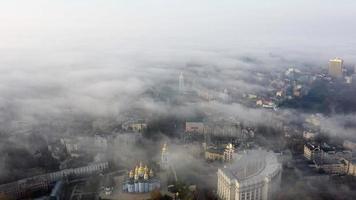 Aerial view of the city in the fog photo