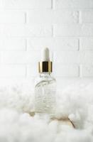 Transparent face antiaging gel for massage prosedures in cosmetology salon photo