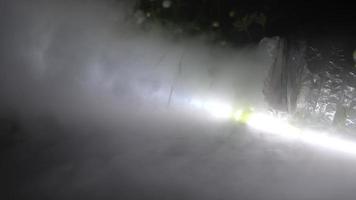 A large pipe fills the greenhouse with fog. photo