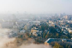 Aerial view of the city in the fog photo