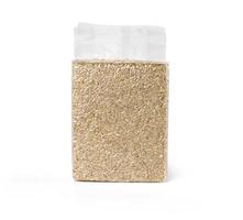Brown rice in transparent plastic vacuum sealed bag isolated on white background with clipping path. photo