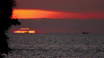 Sunset over ocean landscape with JetSki, Karon beach, Phuket, Thailand video