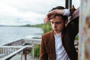 man standing on a pier photo