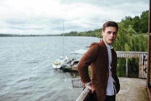 man standing on a pier photo