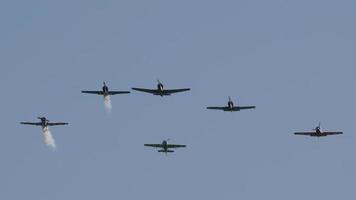 NOVOSIBIRSK, RUSSIAN FEDERATION JULY 28, 2019 - Sport trainer aircrafts performance group aerobatic flight. Airshow at the Mochische aerodrome UNNM video