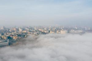 Aerial view of the city in the fog photo