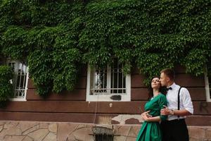 European beautiful couple posing on the street photo