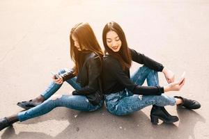 Two young adult girls photo