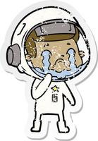 distressed sticker of a cartoon crying astronaut vector