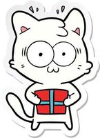 sticker of a cartoon surprised cat with christmas present vector