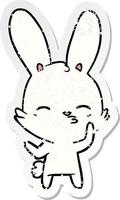 distressed sticker of a curious bunny cartoon vector