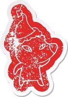 cute cartoon distressed sticker of a bear wearing santa hat vector