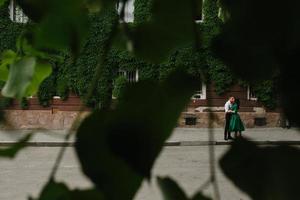 European beautiful couple posing on the street photo