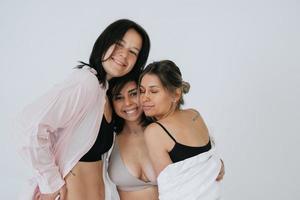 diverse models wearing comfortable underwear, enjoying time together photo