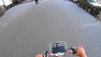 Kiev, Ukraine - May 21, 2021 First-person view. Man rides a bicycle in the Kiev photo