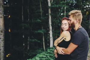 guy hugging his girlfriend photo