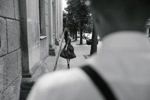 European beautiful couple posing on the street photo