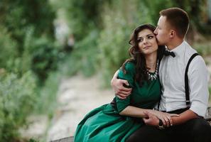 man and woman at the lake photo