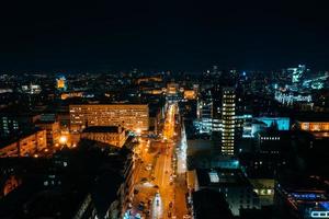 High-altitude aerial view of the city at night photo