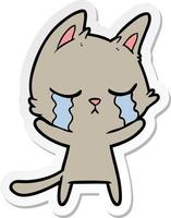 sticker of a crying cartoon cat vector