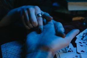 reading the lines hand in a man's hands photo