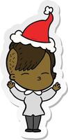 sticker cartoon of a squinting girl wearing santa hat vector