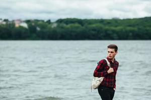 man standing on a pier photo