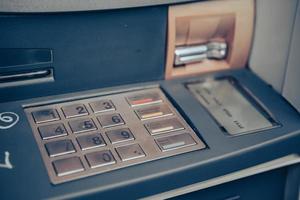 Automated teller machine close up. ATM machine keypad. photo