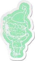 cartoon distressed sticker of a happy boy wearing santa hat vector