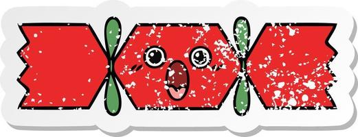 distressed sticker of a cute cartoon christmas cracker vector